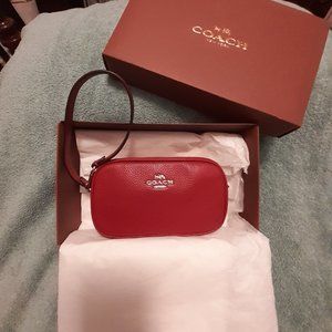 Authentic COACH wristlet clutch NWT. Red